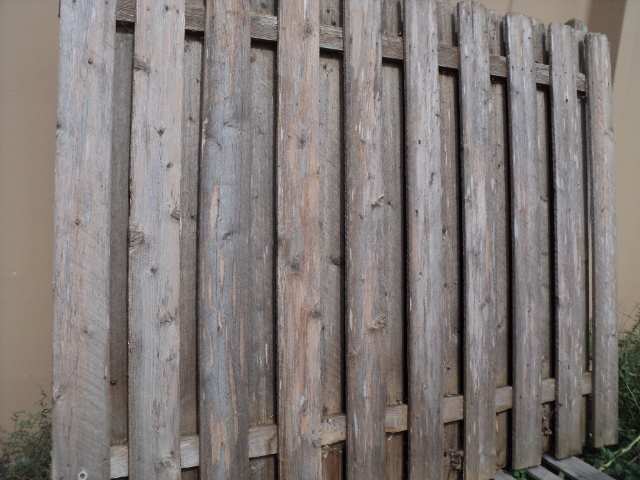 3 fence panels of weathered grey bo...