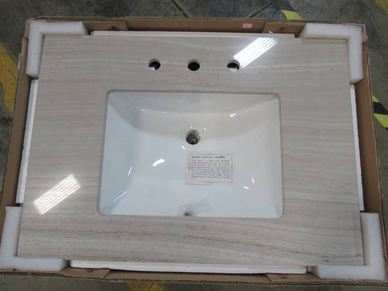 lot 60 image: Home Decorator Collection 31 in. W Marble Single Vanity Top in White Oak with White Basin.