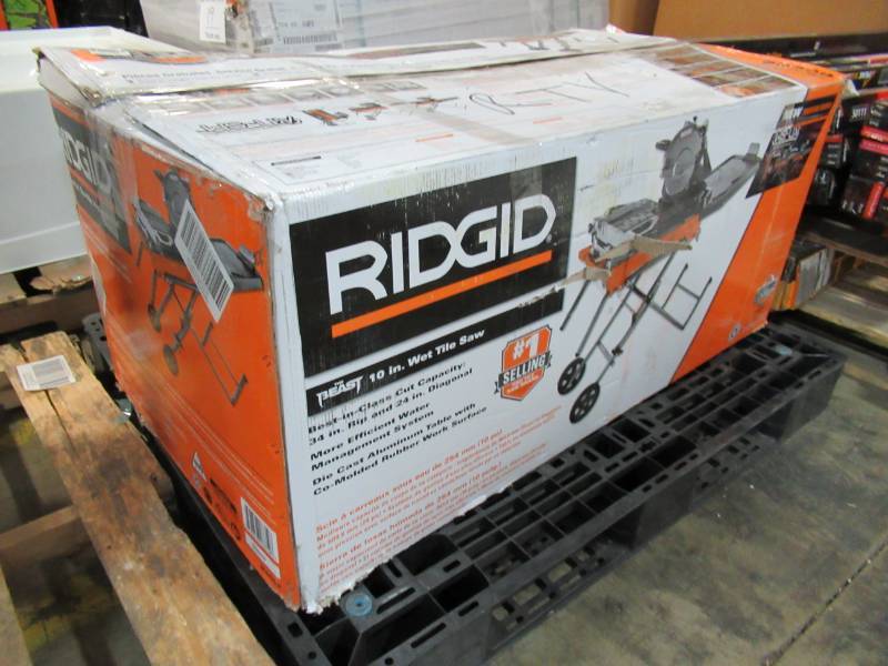 lot 23 image: RIDGID 10 in. Wet Tile Saw with Stand, Model R4092.