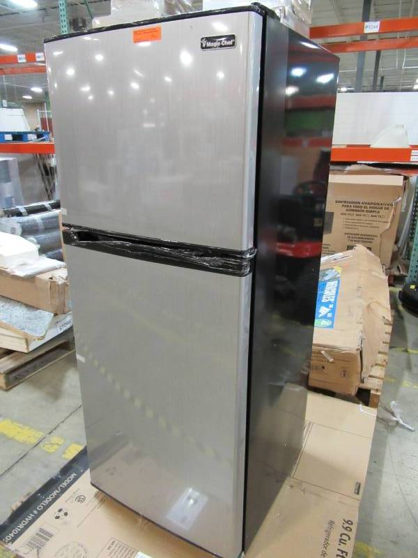 lot 25 image: Magic Chef 9.9 cu. ft. Top Freezer Refrigerator in Stainless HVDR1040S
