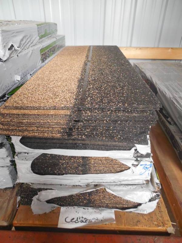 lot 39 image: (4) TAMKO HIP AND RIDGE SHINGLE BUNDLES  IN CEDAR