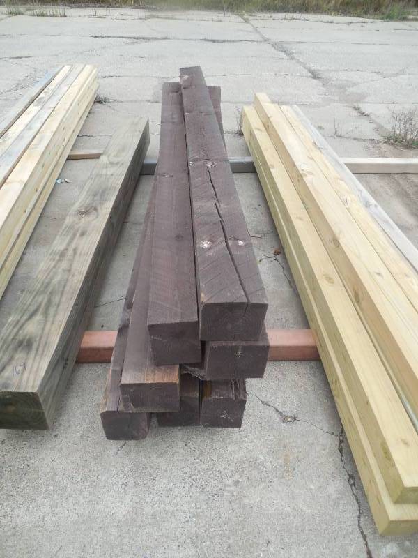 lot 168 image: (8) BROWN TREATED 5 X 6 X 8 POSTS