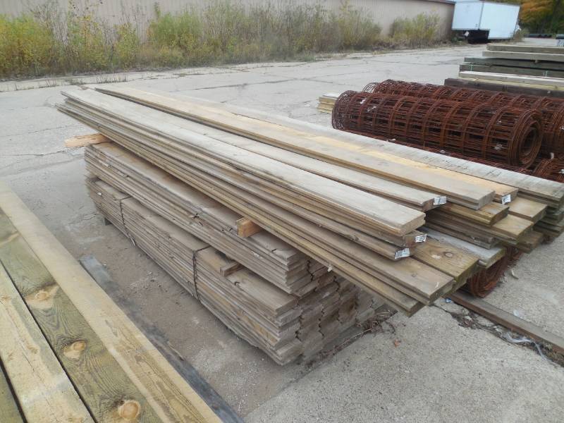 lot 180 image: PILE OF 1 X 6 X 8 TREATED TONGUE & GROOVE  VARIOUS LENGTHS