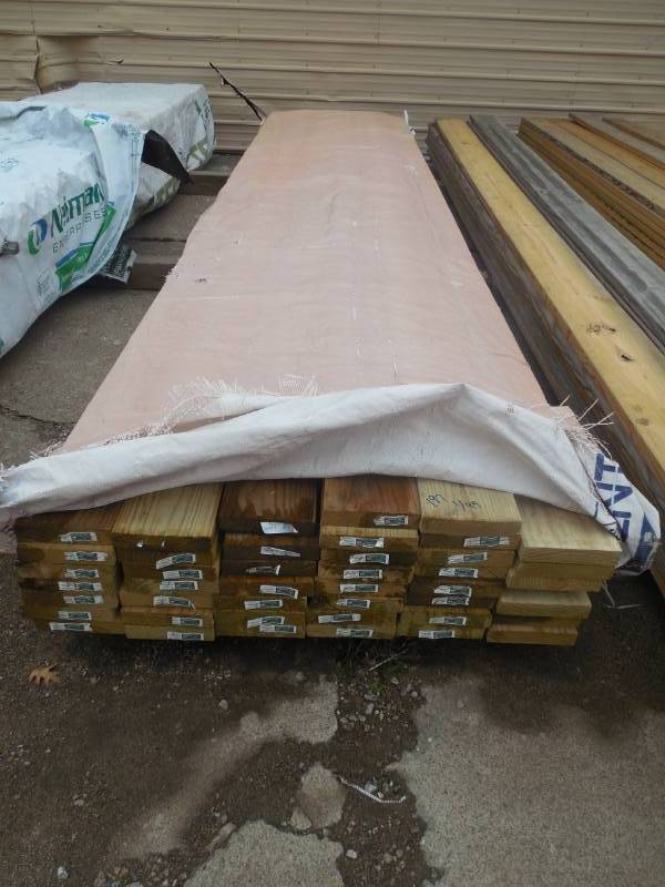 lot 197 image: (44) 2 X 8 X 18 GREEN TREATED LUMBER