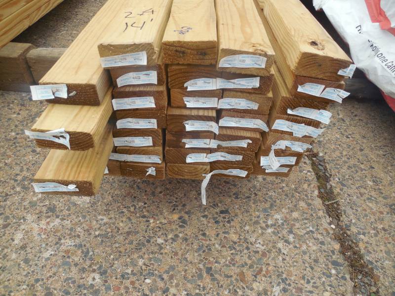 lot 202 image: (34) 2 X 4 14 GREEN TREATED LUMBER