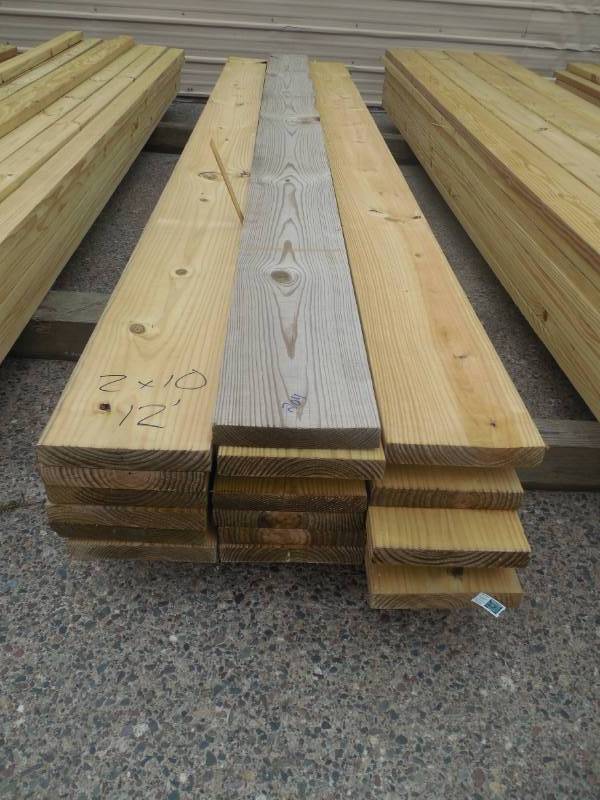 lot 204 image: (19) 2 X 10 X 12 GREEN TREATED LUMBER