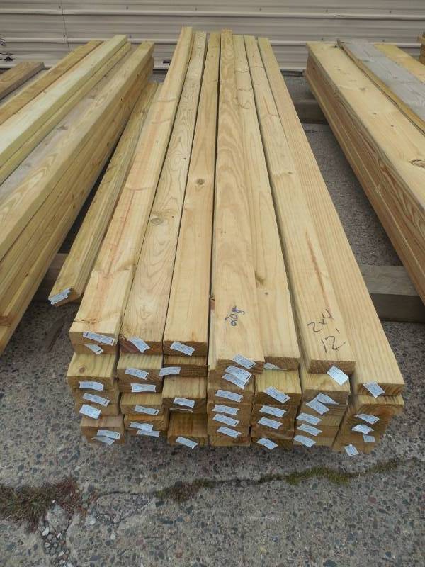 lot 205 image: (46) 2 X 4 X 12 GREEN TREATED LUMBER