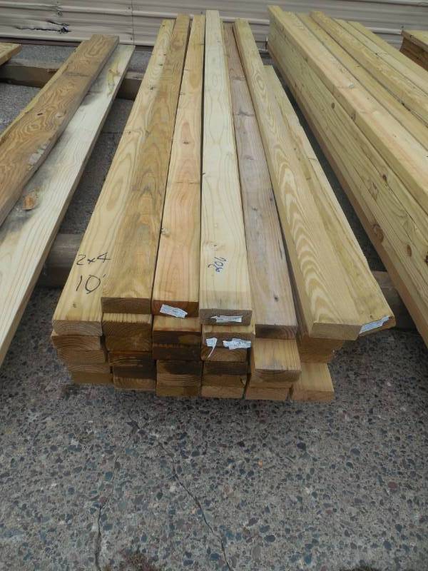 lot 206 image: (35) 2 X 4 X 10 GREEN TREATED LUMBER