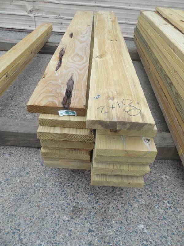 lot 209 image: (19) 2 X 10 X 8 GREEN TREATED LUMBER