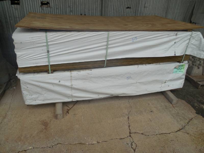 lot 214 image: (24) 34 x 4 x 8  Pressure Treated Plywood BUNDLE