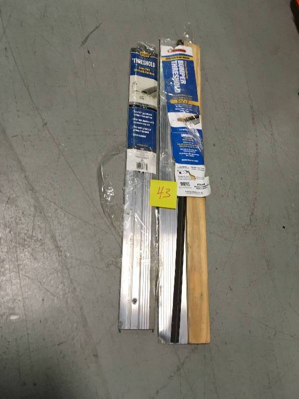 lot 43 image: 5.5 in. x 36 in. Fixed Sill Bumper Threshold  LOT OF 2 PCS not used