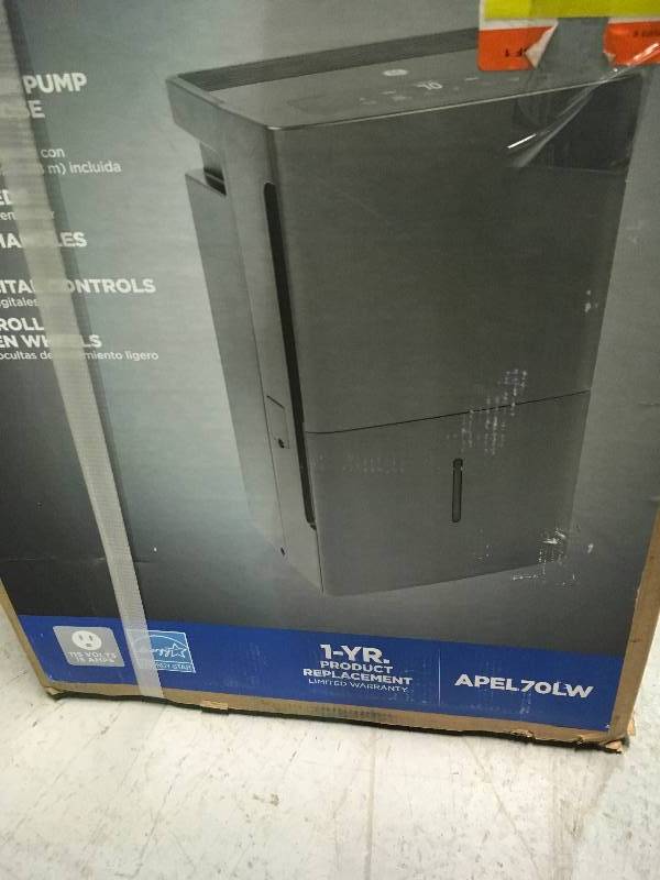lot 57 image: GE 70 Pints Dehumidifier With Built in Pump APEL70LW not used