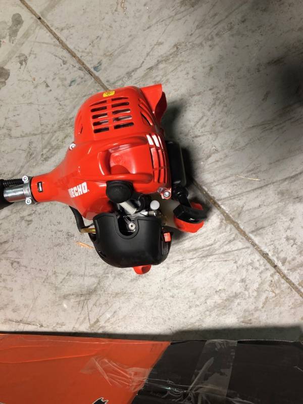 lot 107 image: ECHO  2-Cycle 21.2cc Straight Shaft Gas Trimmer in good conditions