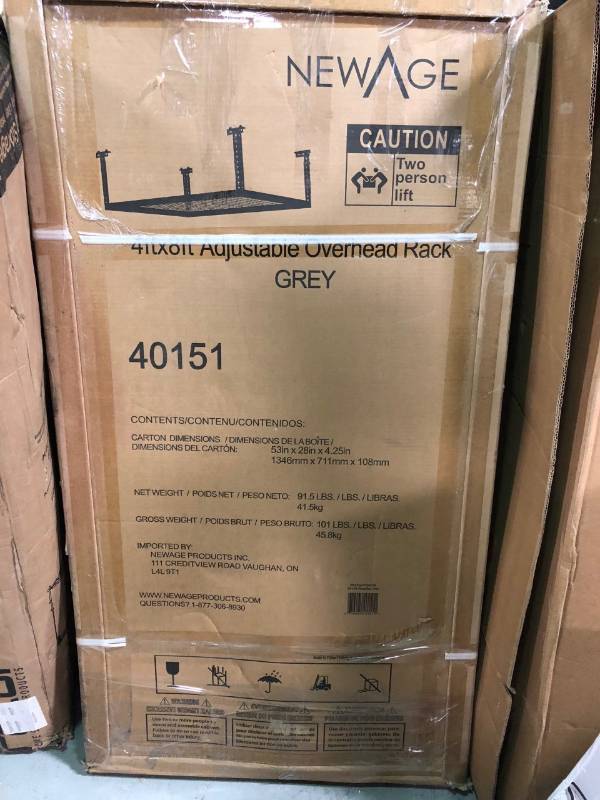 lot 110 image: NewAge Products 40151 4-Feet by 8-Feet Ceiling Mount Garage Storage Rack, Grey not used