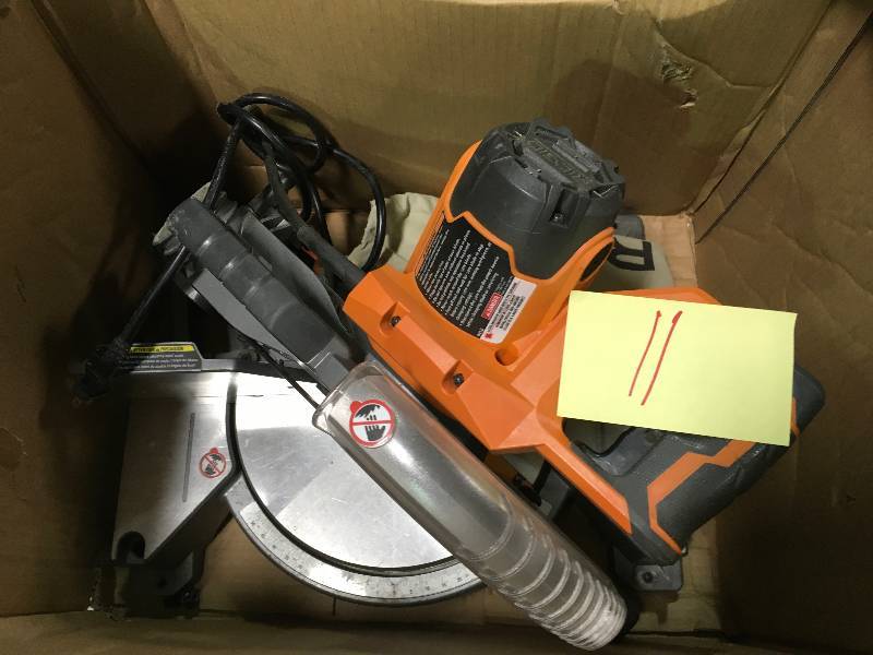 lot 11 image: RIDGID 15-Amp 10 in. Dual Bevel Miter Saw with Laser  Used in good working cond.