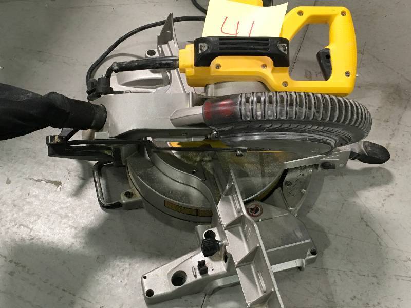 lot 41 image: DEWALT DW713 10 in. Portable Compound Miter Saw Used in good working cond.