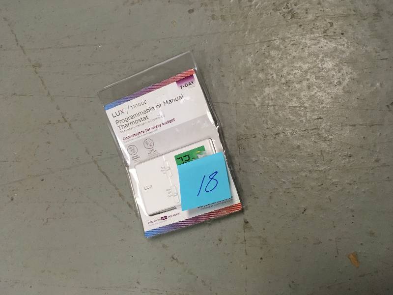 lot 18 image: Lux Products TX100E 7-Day Programmable Thermostat, White in good conditions
