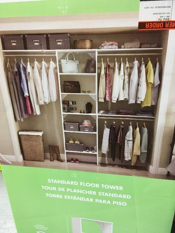 lot 23 image: Closet Maid 1675 Style 82 White Melamine Floor Mount 6-Shelves Closet System not used
