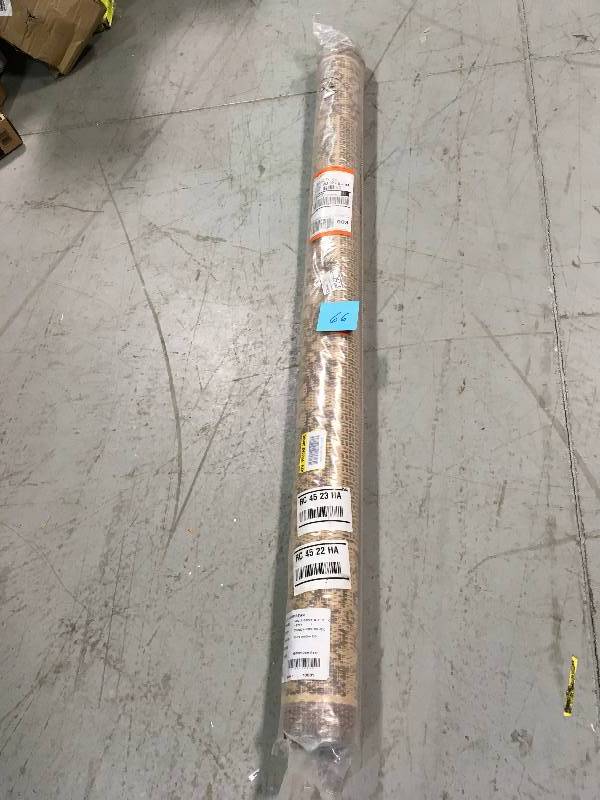 lot 66 image: Summer Chimes NaturalCocoa 5 ft. x 8 ft. Area Rug not used