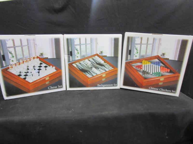 lot 12 image: 3 Games still in the box