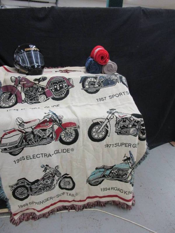 lot 14 image: Harley Davidson Blanket, Helmet and 3 fleece blankets