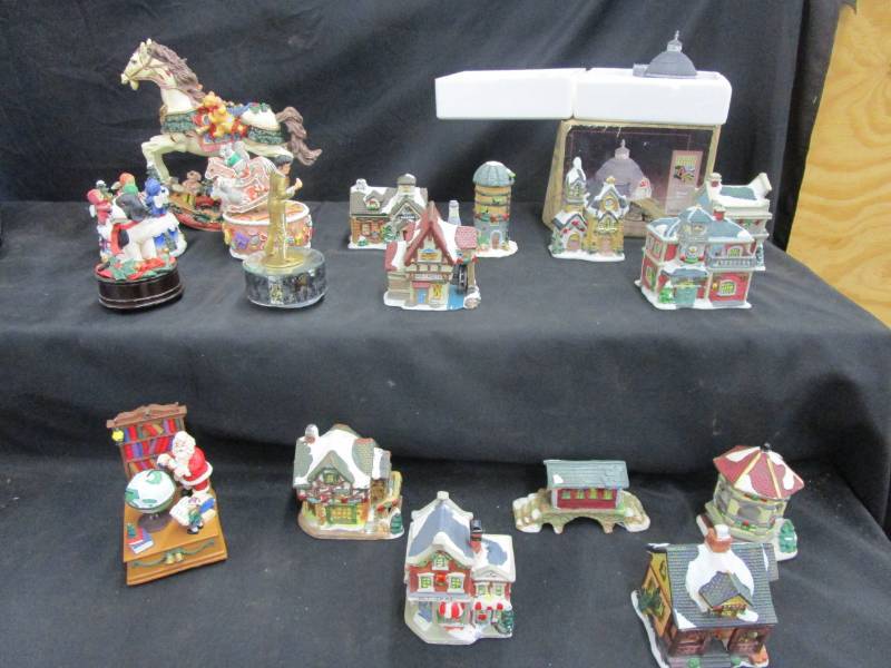 lot 16 image: Various Christmas Musical figurines  and village houses