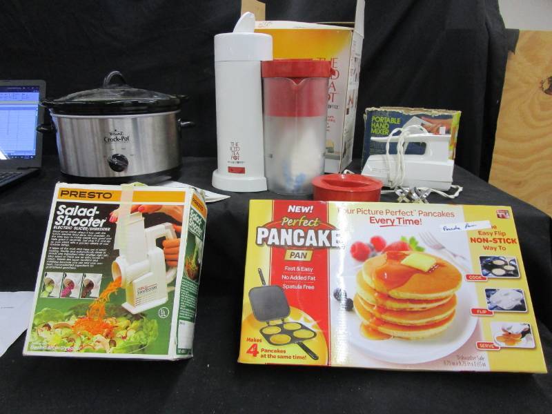 lot 18 image: Iced Tea Pot, Crock Pot, Perfect Pancake Oan, Salad Shooter and hand mixer