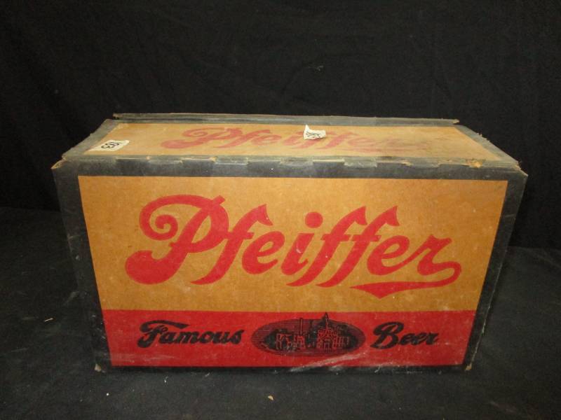 lot 55 image: Pfeiffer Famous Beer 24 empty cans