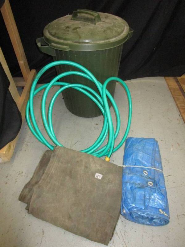 lot 56 image: Garden Hose, Trash Can, 2 Tarps