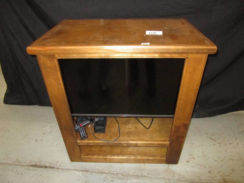 lot 92 image: Tv Stand, with LG Tv, Remotes and Cords