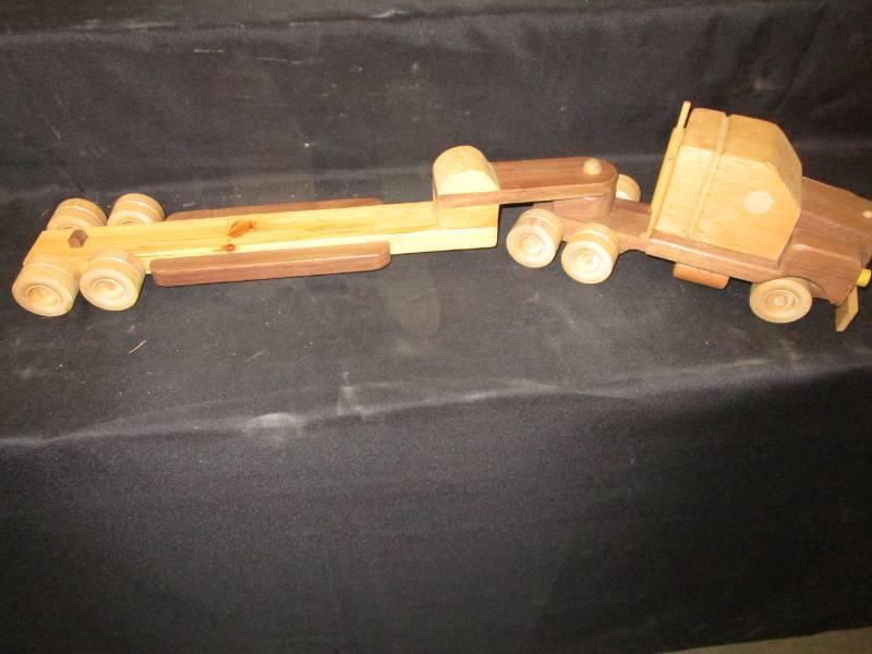 lot 110 image: Handmade Wooden Toy Truck with Trailer, 33 in long