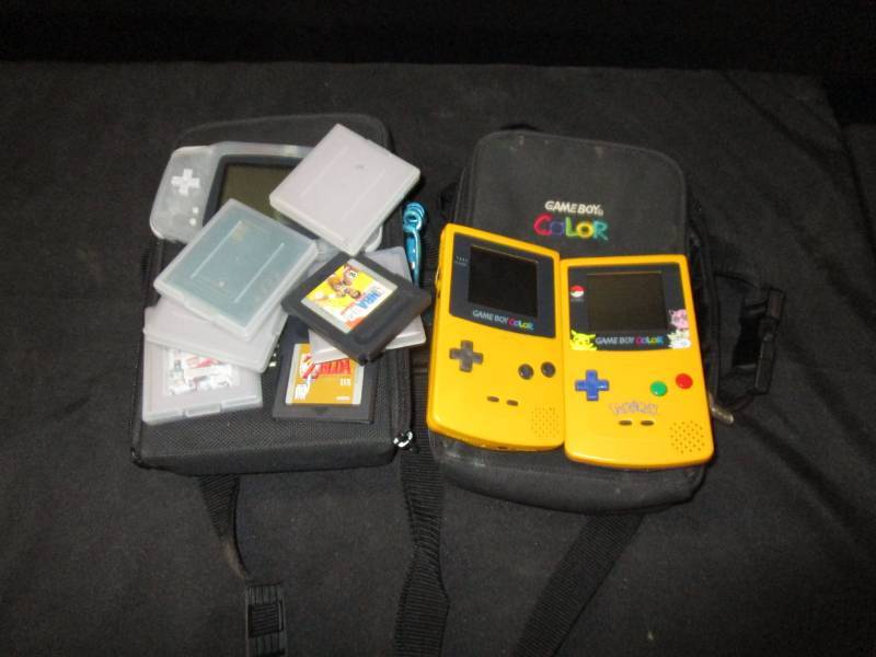 lot 150 image: 2 Gameboy Color, Gameboy Advance with case and misc games