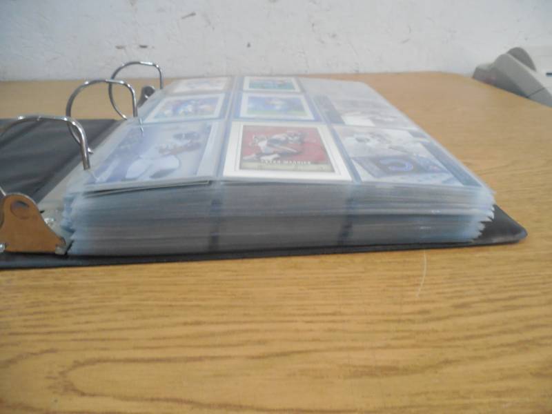 lot 19 image: Huge Football Rookie Card Collection in 3 ring binder