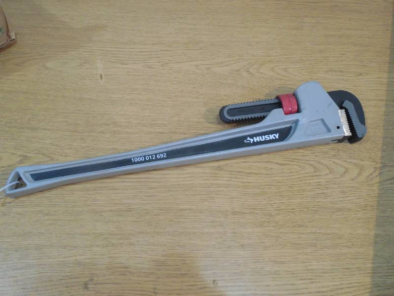 lot 88 image: Husky 24 in. Aluminum Pipe Wrench with 2-12 in. Jaw Capacity