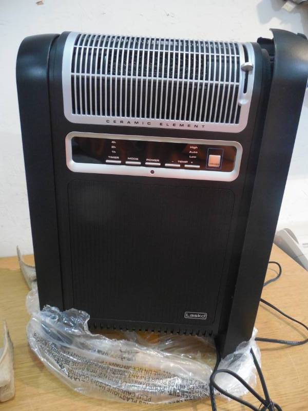 lot 36 image: Lasko Cyclonic Heater with Remote