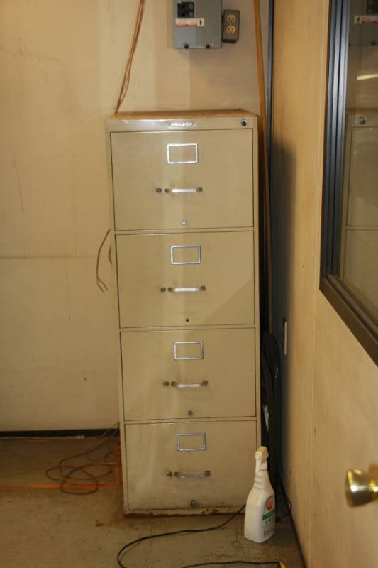 Table, Chair,  AC unit, and 2 Cabinets Room 11