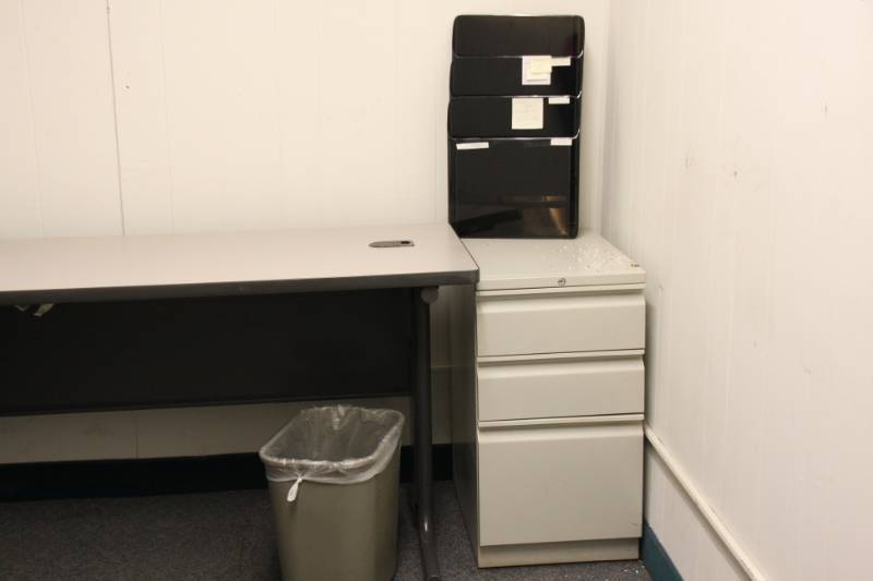 2 File Cabinets one Tan and one Brown one Room 24