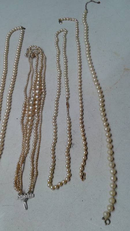 lot 12 image: Lot Of Pearl Necklaces, Untested For Realness, Used, Some May Show Wear