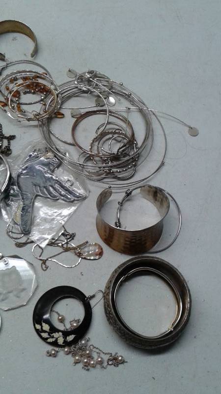 lot 13 image: Bag Filled With Random Costume Jewelry, Used, Show Wear, Some Tangled