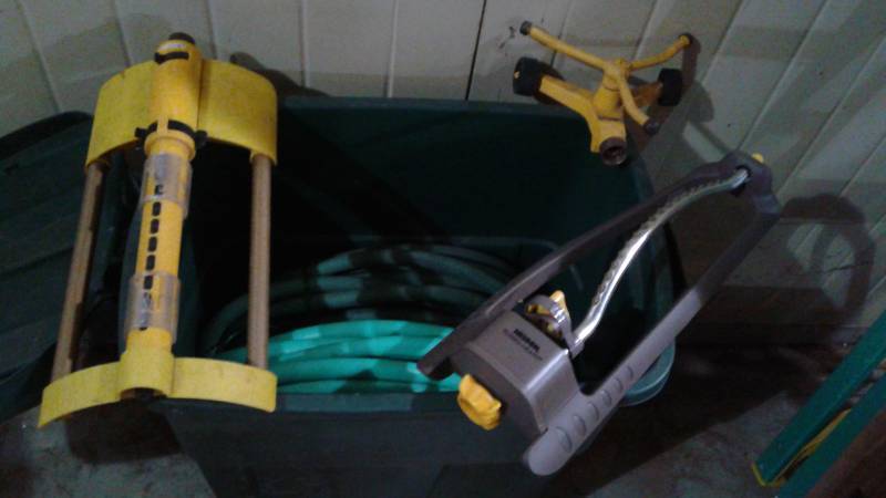 lot 26 image: Two Garden Hoses And Sprinklers, Used, Show Wear