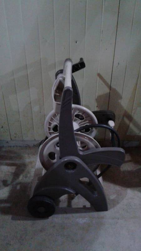 lot 27 image: Garden Hose Rolling Cart, Used