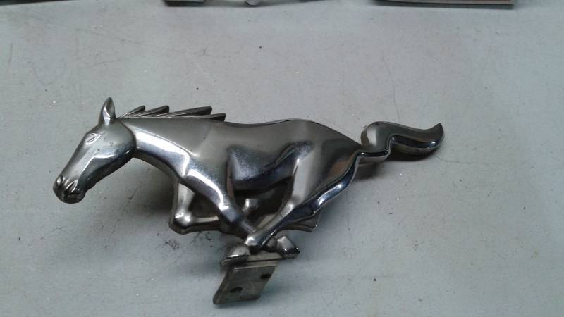 lot 86 image: 1960s Chrome Ford Mustang Car Emblem And GMC Letters