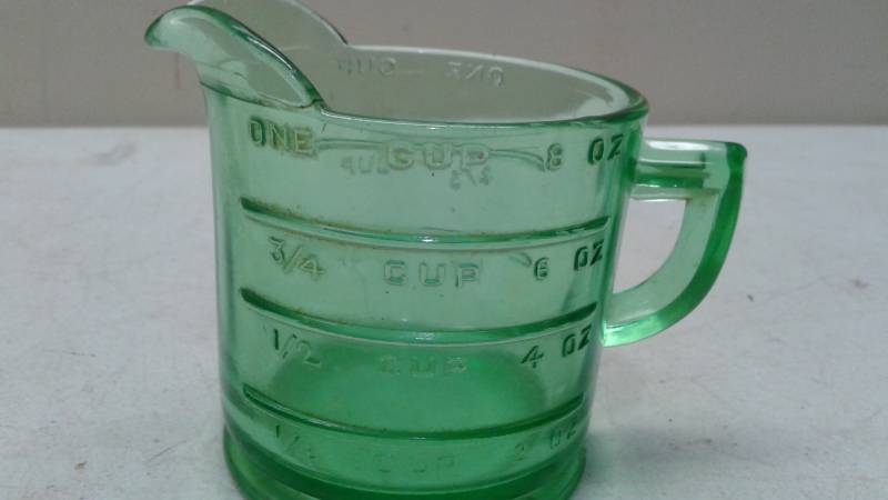lot 88 image: Vintage Uranium Glass Measuring Cup, Used, Some Wear, Has Scratch On It