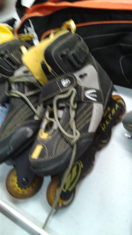 lot 105 image: Bag Filled Lots Of Sporting Goods, Roller Blades, Balls