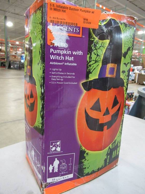 lot 22 image: 5 ft. Inflatable Outdoor Pumpkin with Witch Hat - New in Box