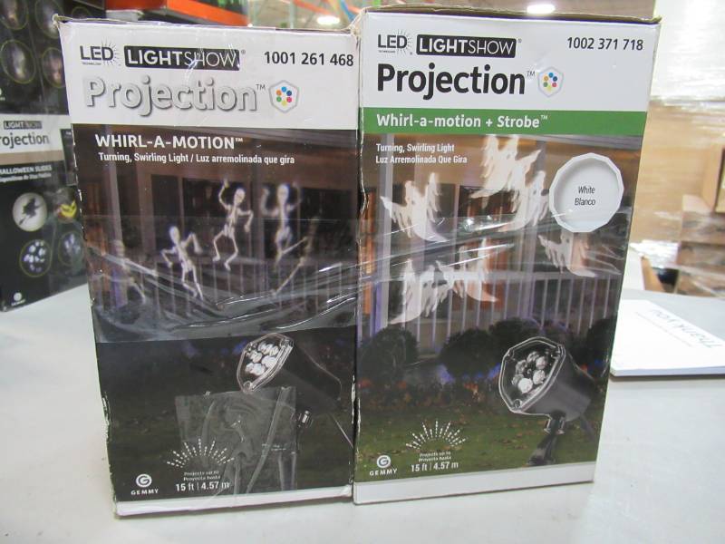 lot 31 image: 2 Whirl-A-Motion Skeletons & Ghosts White Projection SpotlightStrobe, New in Box