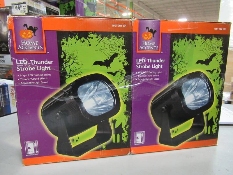 lot 32 image: Two 8.5 in. Thunder Strobe Lights - One light is missing the stand.