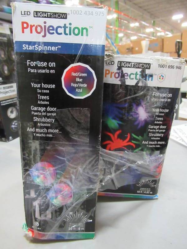 lot 33 image: Two 11.81 in. Projection Whirl-A-Motion OGPB Spiders & Stars - New in Box.
