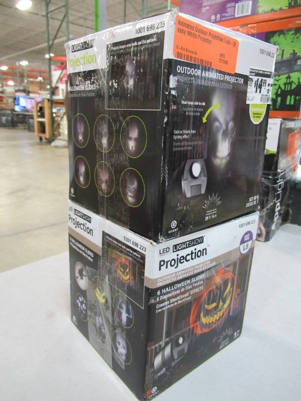 lot 37 image: Two Animated Outdoor Projectors Each has 6 Halloween Slides - New in Box