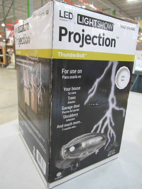 lot 52 image: LED Projection Thunder Bolt with Sound - New in Box